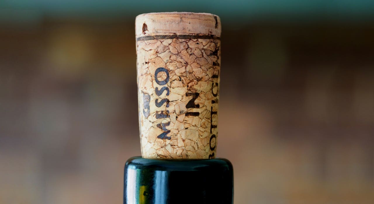 How to open a wine bottle without a corkscrew